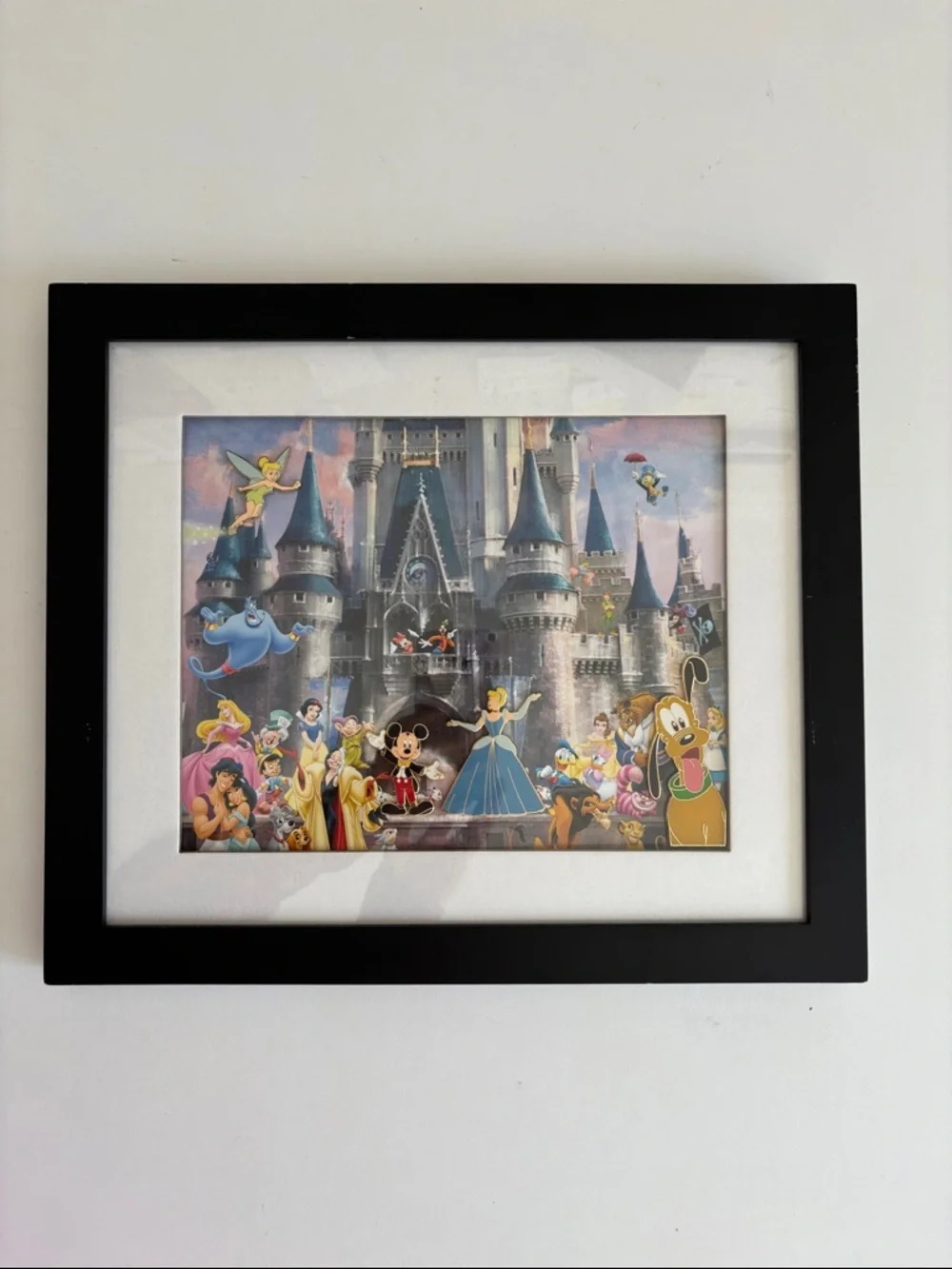 Disney Cinderella Castle lithograph print that includes four‎ collectible pins